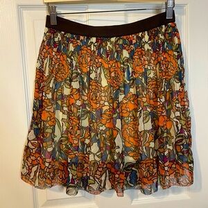 Fossil floral mini skirt w/ pleats, elastic waistband & cream lining sz XS